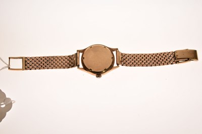 Lot Baume - 1950s 9ct gold cased bracelet watch