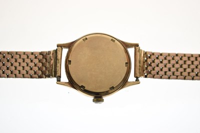 Lot Baume - 1950s 9ct gold cased bracelet watch