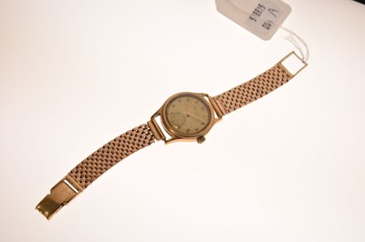 Lot Baume - 1950s 9ct gold cased bracelet watch