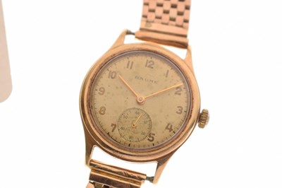 Lot Baume - 1950s 9ct gold cased bracelet watch