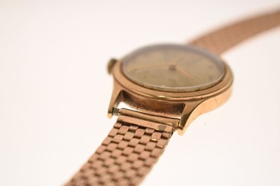 Lot Baume - 1950s 9ct gold cased bracelet watch