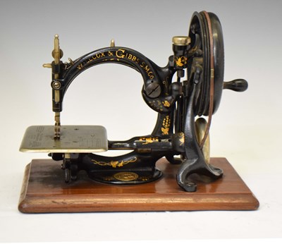 Lot 277 - Late 19th century Willcox & Gibbs C-frame hand-cranked sewing machine