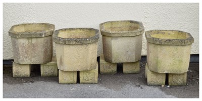 Lot 826 - Set of four Sandford Stone octagonal garden planters