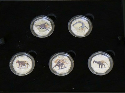 Lot 148 - Isle of Man - Charles III five silver proof 50p coin set commemorating Jurassic Britain