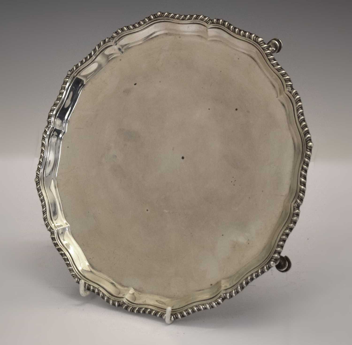 Lot George V silver salver with gadroon border