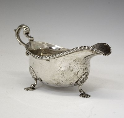 Lot 104 - Elizabeth II silver sauceboat with gadroon border