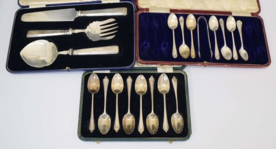 Lot 115 - Three cased sets of silver servers and spoons