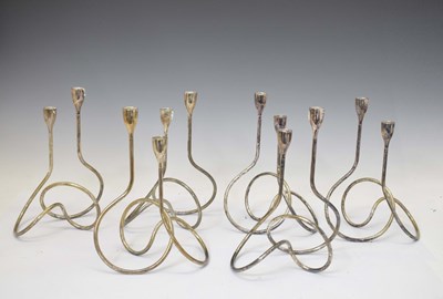 Lot 499 - Suite of six Black & Blum stylised chrome two armed candelabra