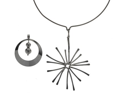 Lot 48 - Circa 1975 abstract silver pendant necklace, and a Danish 830 standard pendant (2)