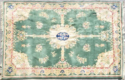 Lot 516 - Large Chinese 'Tai Ping' green ground carpet