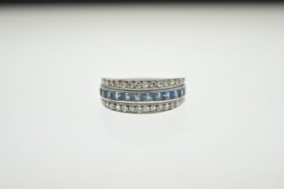 Lot Art Deco diamond, sapphire and emerald 'day and night' eternity ring