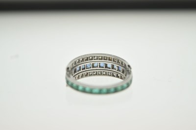 Lot Art Deco diamond, sapphire and emerald 'day and night' eternity ring