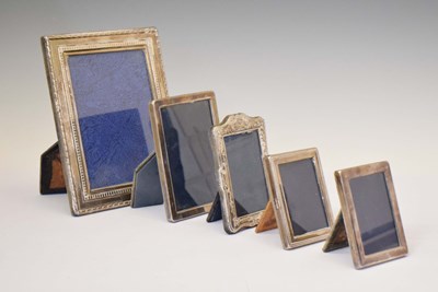 Lot 108 - Five Elizabeth II silver-mounted easel photo frames