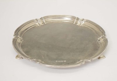 Lot 97 - Elizabeth II silver card tray with pie-crust edge and standing on three cast feet