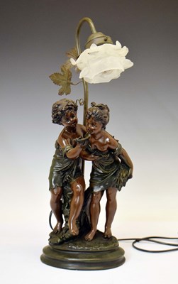 Lot 223 - After Auguste Moreau (French, 1834-1917) - Bronzed resin figural lamp