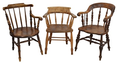 Lot 592 - Three 19th century smoker bow chairs