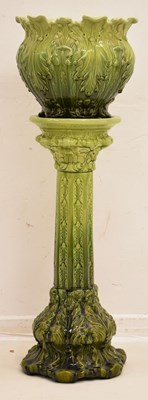 Lot 363 - Late Victorian leaf moulded pottery jardinière and pedestal