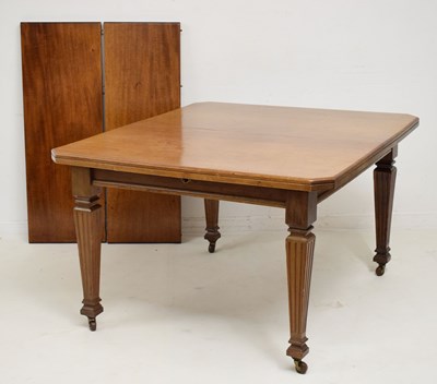 Lot 579 - Edwardian mahogany dining table with canted corners