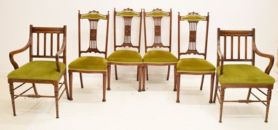 Lot 587 - Four Edwardian mahogany salon chairs
