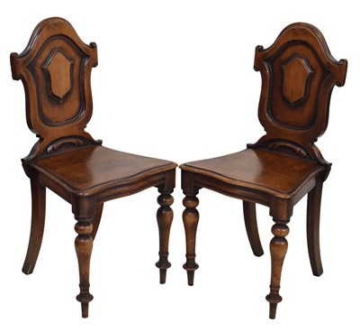 Lot 580 - Pair of Victorian mahogany hall chairs
