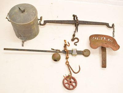 Lot 217 - Vintage iron tractor seat, two beam scales, and urn