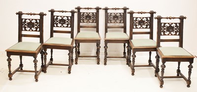 Lot 589 - Set of six Victorian Gothic revival oak dining chairs