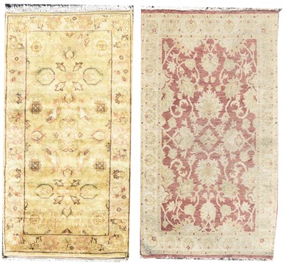Lot 517 - Two Indian wool rugs, retailed by Grutman