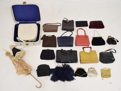 Lot 266 - Good collection of vintage bags, handbags, and clutches, together with two Edwardian parasols