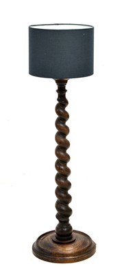 Lot 313 - Oak barley twist standard lamp