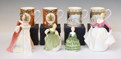 Lot 423 - Four Royal Doulton figurines and four boxed Royal Worcester mugs