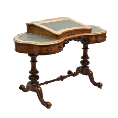 Lot 560 - Victorian walnut kidney shaped desk