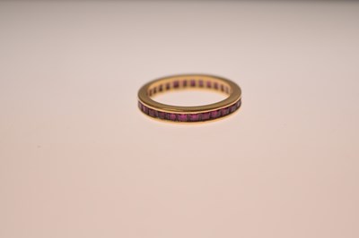 Lot 13 - 18ct gold and ruby full eternity ring