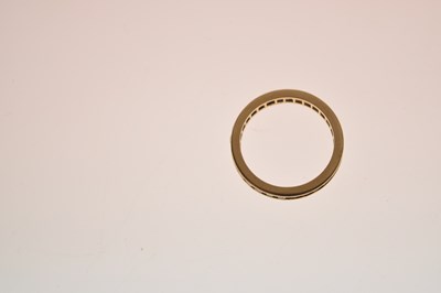 Lot 13 - 18ct gold and ruby full eternity ring