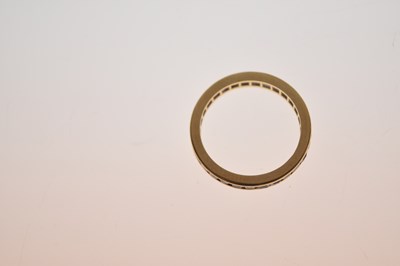 Lot 13 - 18ct gold and ruby full eternity ring