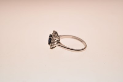 Lot 8 - Sapphire and diamond 18ct white gold cluster ring