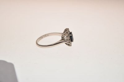 Lot 8 - Sapphire and diamond 18ct white gold cluster ring
