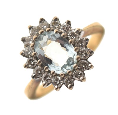 Lot 9 - Aquamarine and diamond 18ct gold cluster ring
