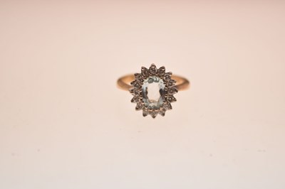 Lot 9 - Aquamarine and diamond 18ct gold cluster ring