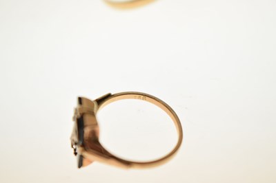 Lot 24 - Two 9ct and black onyx rings together with a similar yellow metal example