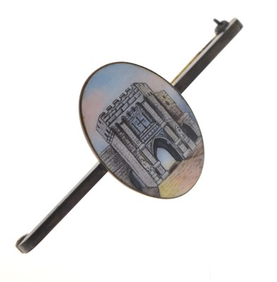 Lot 61 - Silver bar brooch with oval enamelled plaque depicting a gatehouse