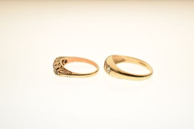 Lot 22 - 9ct gold three-stone gypsy ring and a gypsy set ring (2)