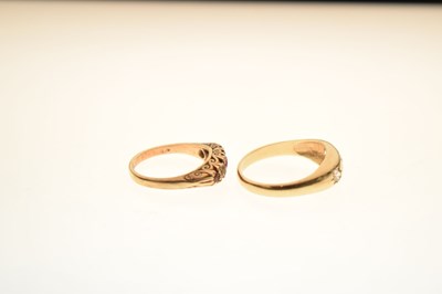 Lot 22 - 9ct gold three-stone gypsy ring and a gypsy set ring (2)