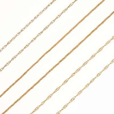 Lot 97 - Two 9ct gold necklaces and a yellow metal necklace