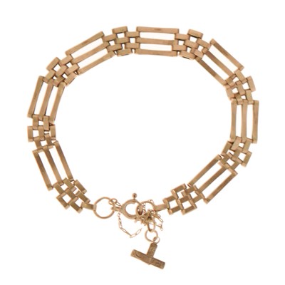 Lot 114 - Yellow metal three-bar gate link bracelet