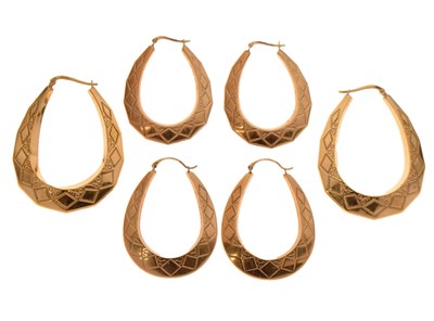 Lot 134 - Three pairs of 9ct gold hoop earrings