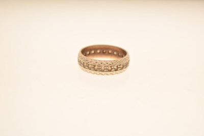 Lot 48 - White metal eternity ring