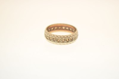 Lot 48 - White metal eternity ring