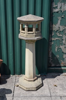 Lot 780 - Modern octagonal composite 'stone' bird table