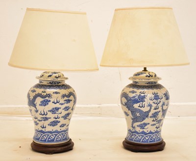 Lot 448 - Pair of modern Chinese blue and white porcelain baluster table lamps