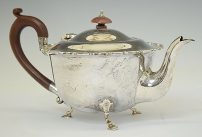 Lot 206 - George V silver teapot of circular form
